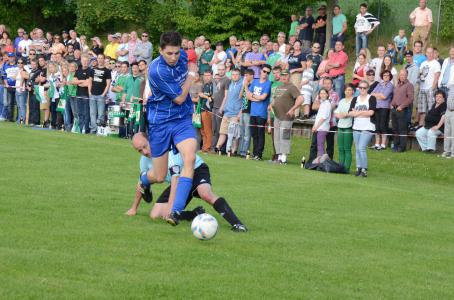 Poppenroth blickt in das brutale Gesicht des Fußballs